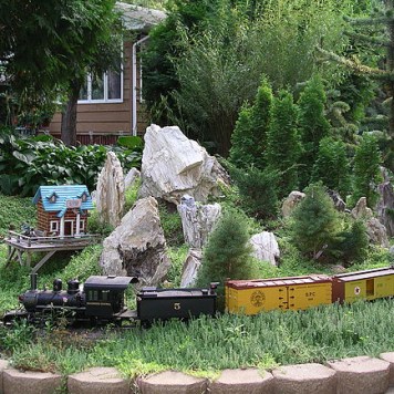 Railroad 2_Lutz Railroad Garden A train winds its way around a rock garden in the Lutz Railroad Garden.